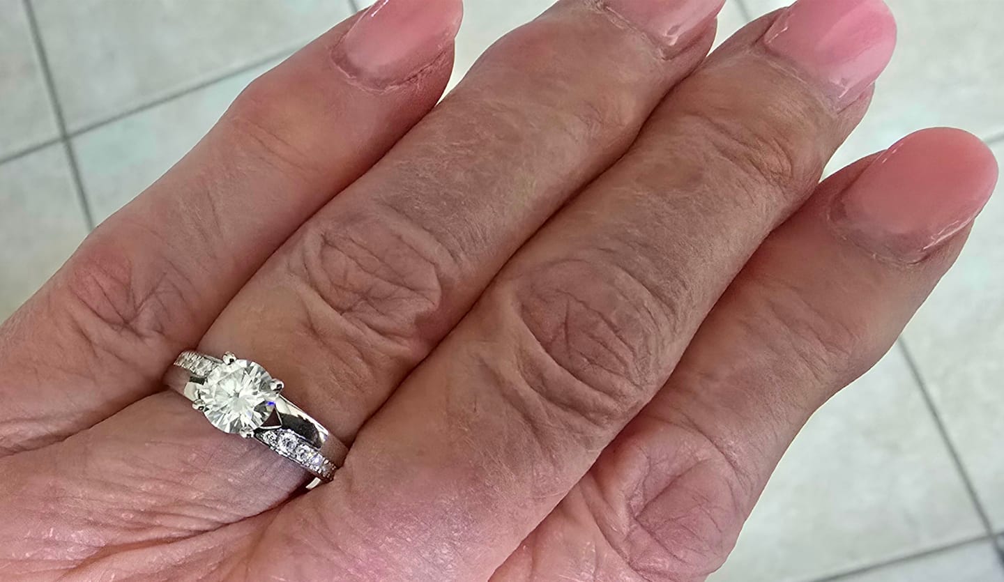 Customer photo review of Round Moissanite Offset Side Stone Row Engagement Ring