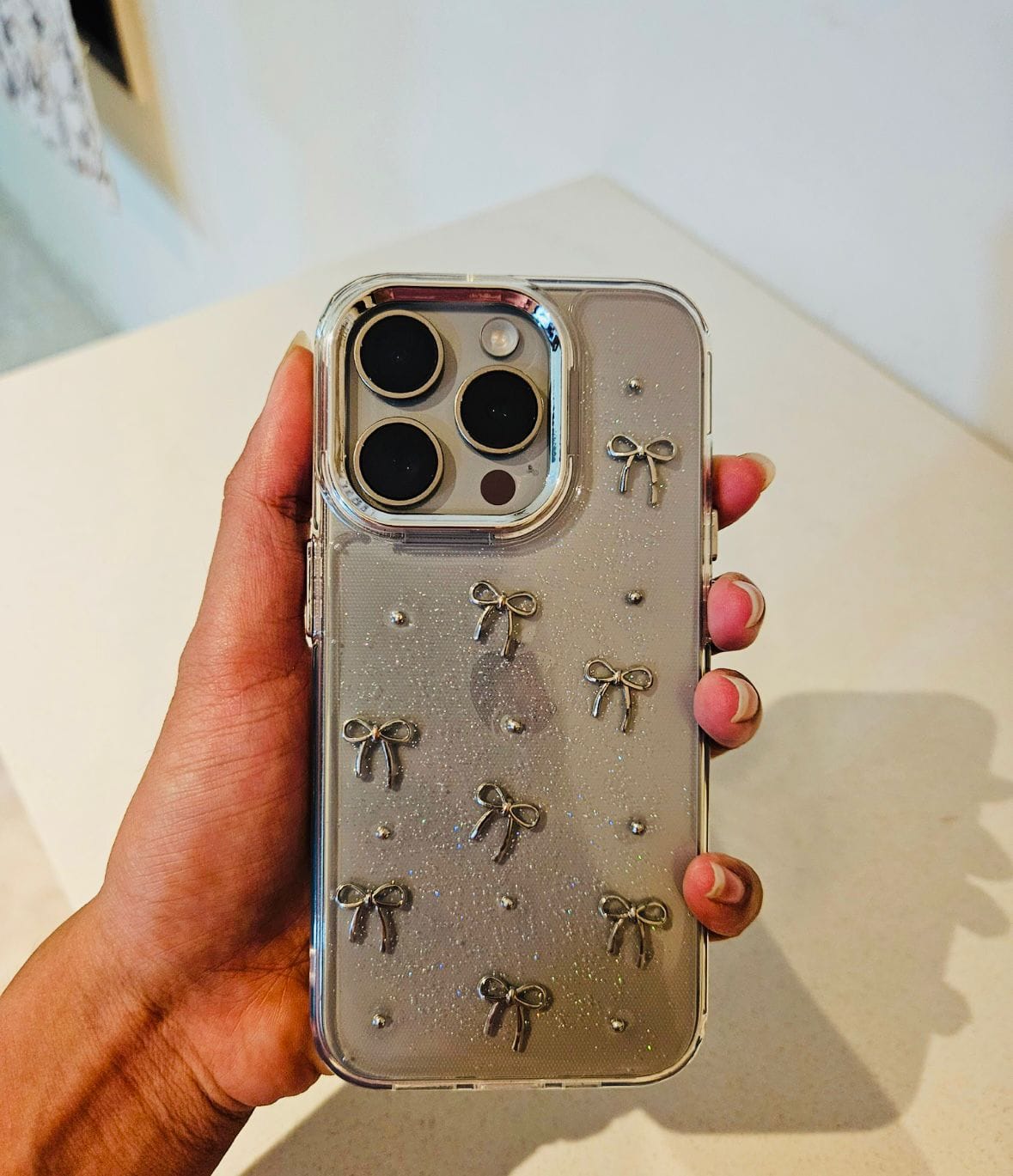Customer photo review of 3D Glitter Silver Bow Transparent iPhone Case