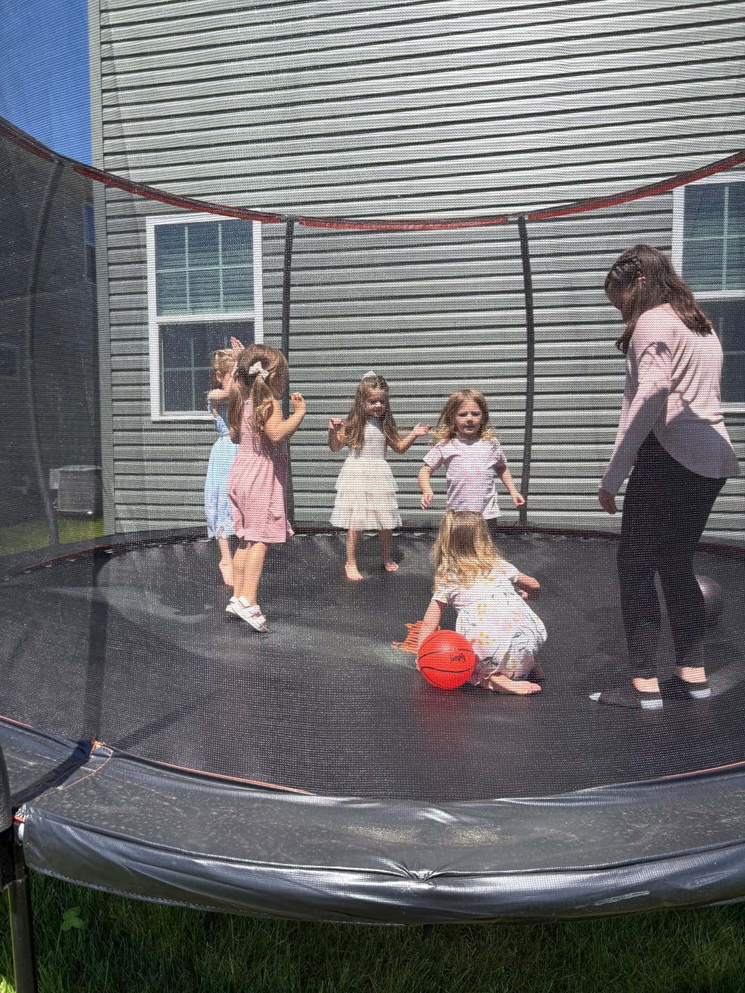 Customer photo review of Classic Outdoor Trampoline with Basketball Hoop