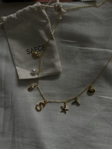 Customer photo review of GOLD OCEAN LETTER NECKLACE