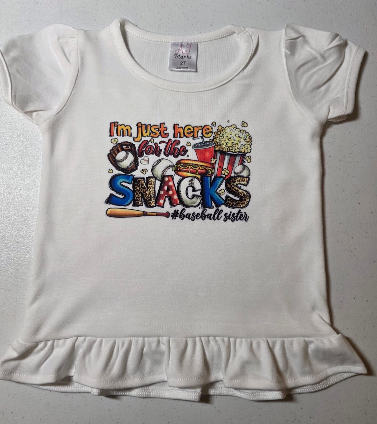 Customer photo review of Girl's SUBLIMATION RUFFLE Short Sleeve Shirt