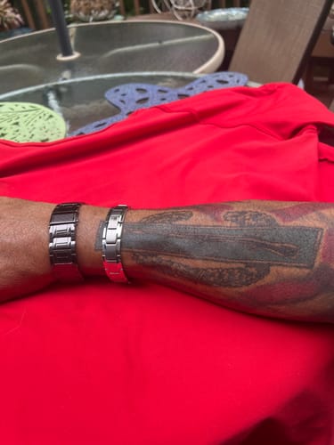 Customer photo review of Iron Man Armor Titanium Magnetic Bracelet: Helps Pair Veterans With A Service Dog Or Shelter Dog