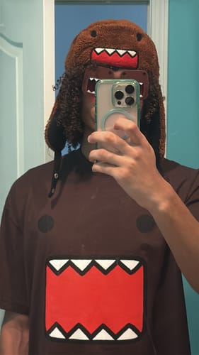 Customer photo review of DOMO FACE TEE