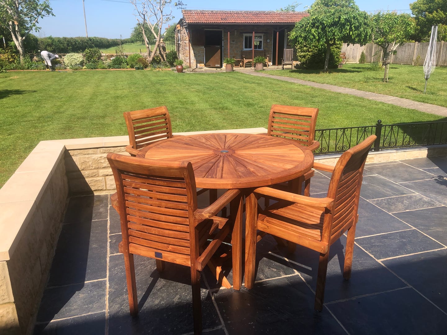 Customer photo review of Teak Garden Furniture Set 120cm Round Sunshine Table 4 x Oxford Stacking Chairs Cushions Included