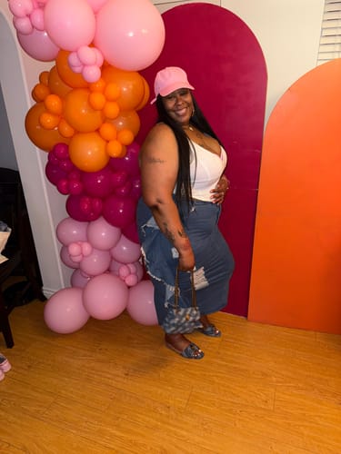 Customer photo review of Keep Him Around Feather Skirt