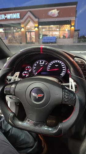 Customer photo review of Genuine Carbon Fiber Steering Wheel With Button Trim For C6 Corvette 2006-2011
