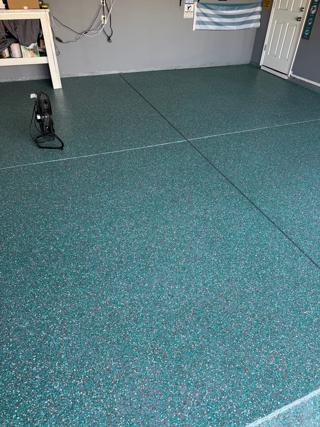 Customer photo review of Epoxy Flakes - Sports Team Garage Floor Chips