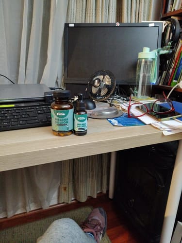 Customer photo review of Melena de León Cápsulas + Gotas - Extracto Ultra Concentrado