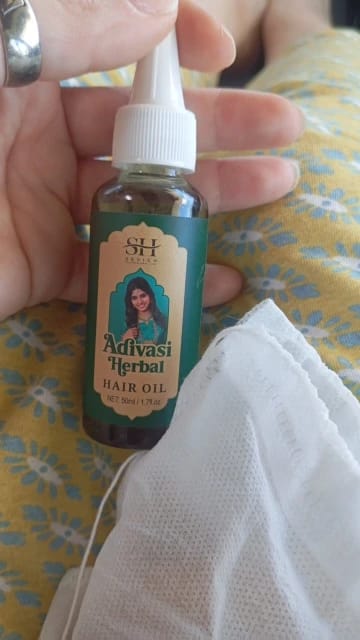 Customer photo review of Ayurvedic Hair Growth Oil And Scalp Massager Set — Clear | KIMLUD