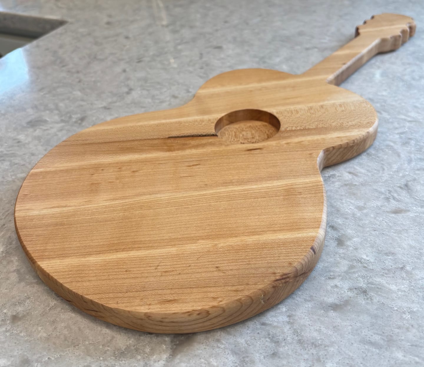 Customer photo review of 23.0x9.0" Stratocaster Guitar Serving Board Acrylic Router Template