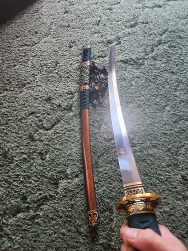 Customer photo review of Handmade Japanese Tachi Odachi Sword Spring Steel With Orange Scabbard