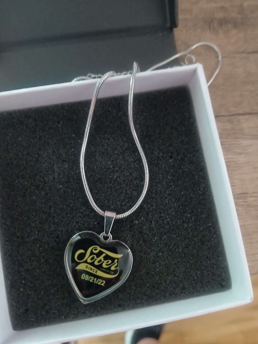 Customer photo review of Sober Since Heart Necklace  w/ Personalized Sobriety Date
