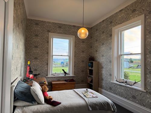 Customer photo review of Dotty Dinosaurs Wallpaper - Grey