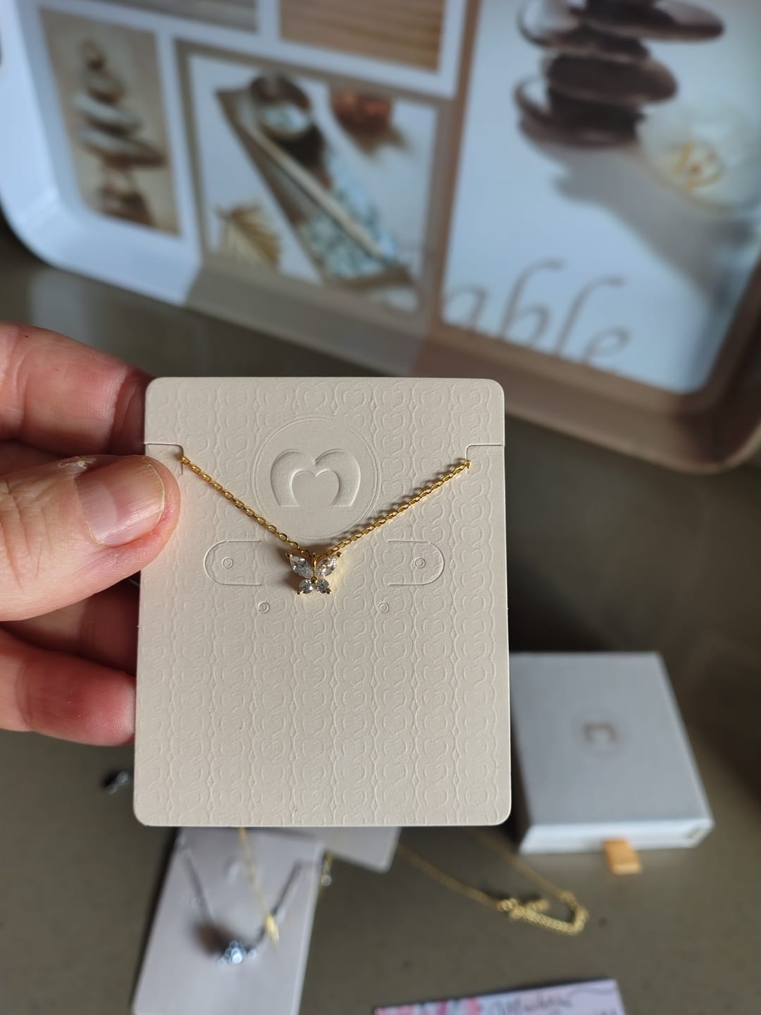 Customer photo review of Collar Mariposa Blanca