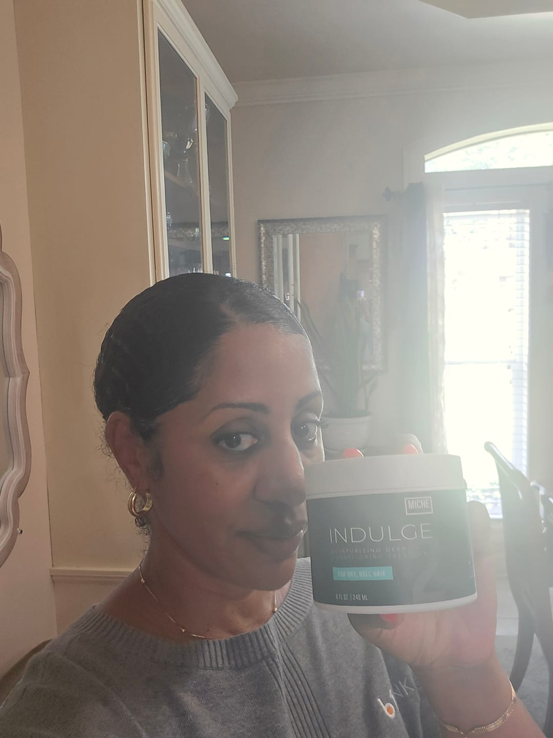 Customer photo review of INDULGE Moisturizing Deep Conditioning Treatment