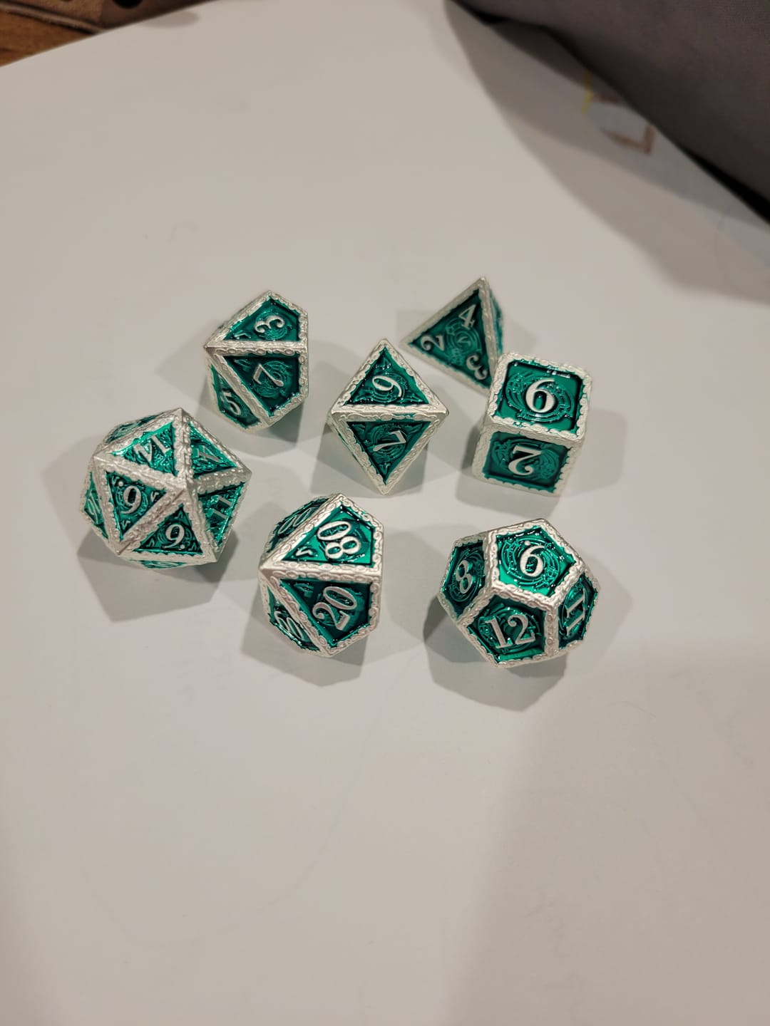Customer photo review of Ballad of the Bard Green and Silver Metal Dice Set 'PRE-ORDER | SPRING EVENT DEAL'