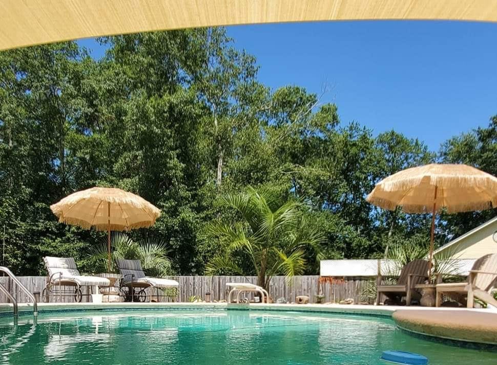 Customer photo review of Custom Sized HDPE Breathable UV Block Triangle Sun Shade Sail for Patio/Pool