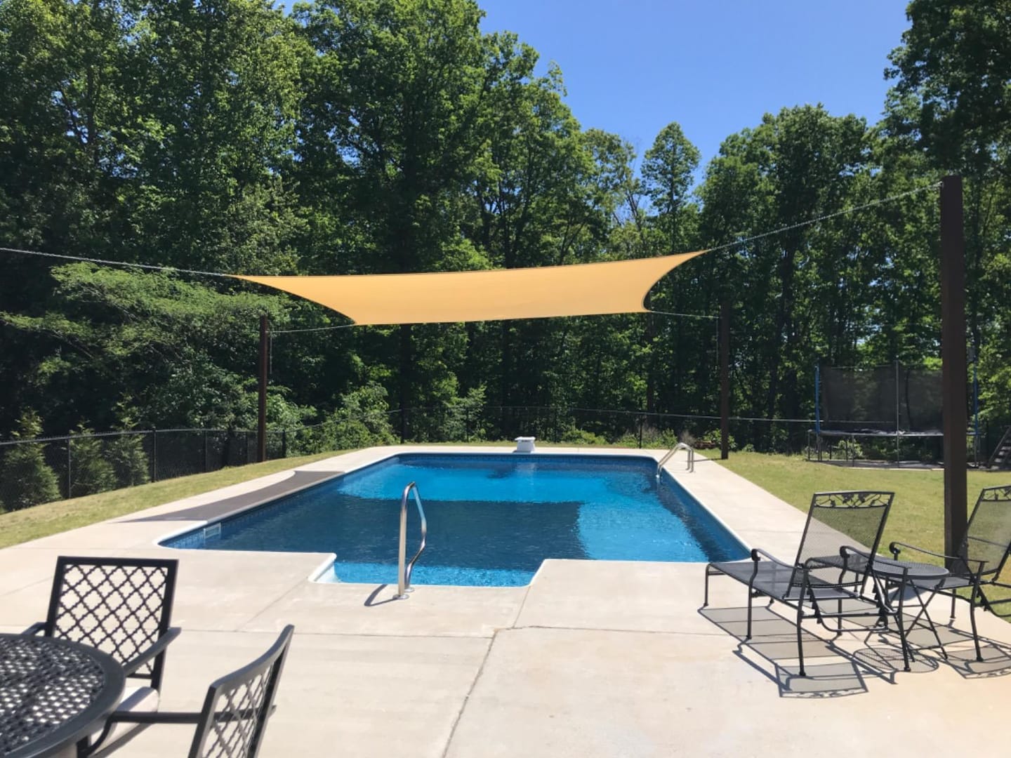 Customer photo review of Custom Sized HDPE Breathable UV Block Triangle Sun Shade Sail for Patio/Pool
