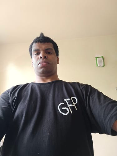 Customer photo review of BROKE TEE