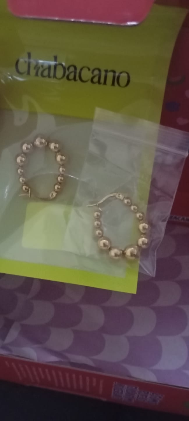 Customer photo review of Arracadas Pom