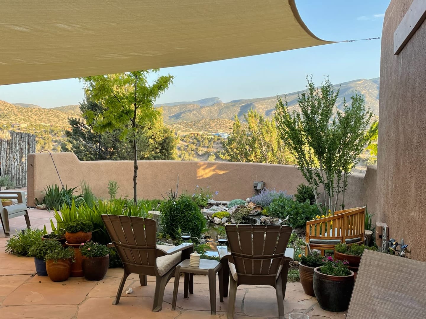 Customer photo review of Custom Sized HDPE Breathable UV Block Triangle Sun Shade Sail for Patio/Pool