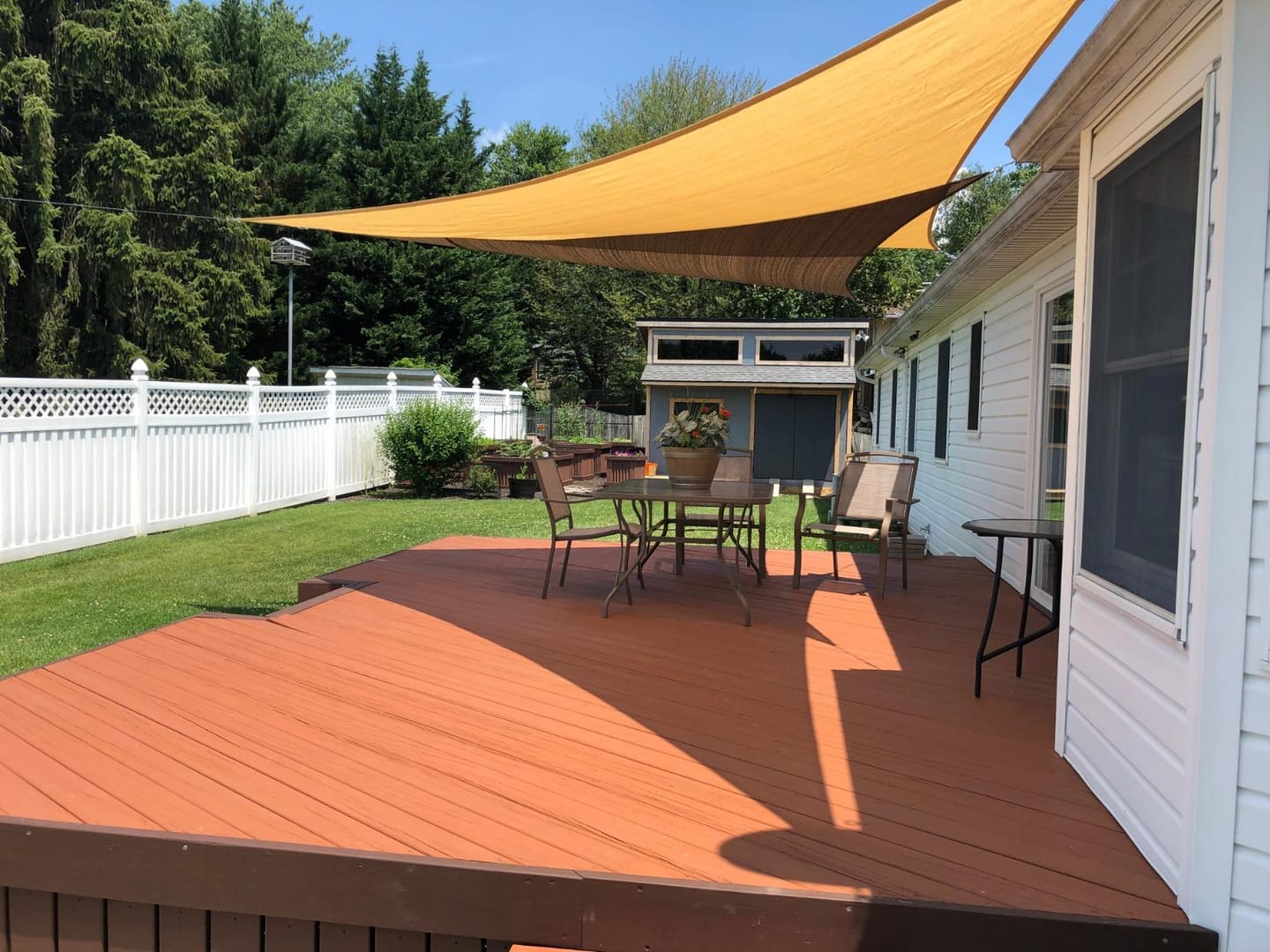 Customer photo review of Custom Sized HDPE Breathable UV Block Triangle Sun Shade Sail for Patio/Pool
