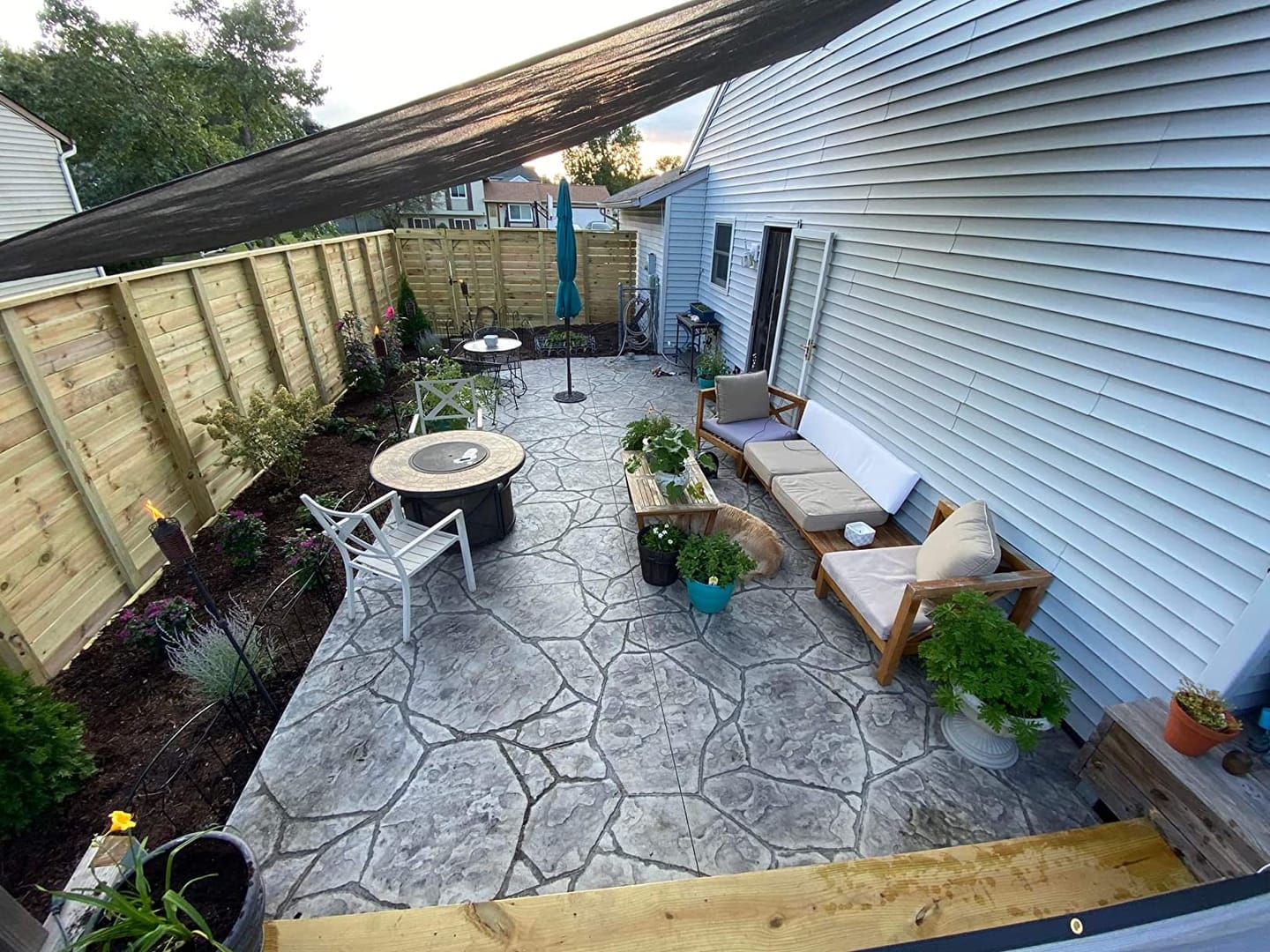 Customer photo review of Custom Sized HDPE Breathable UV Block Triangle Sun Shade Sail for Patio/Pool