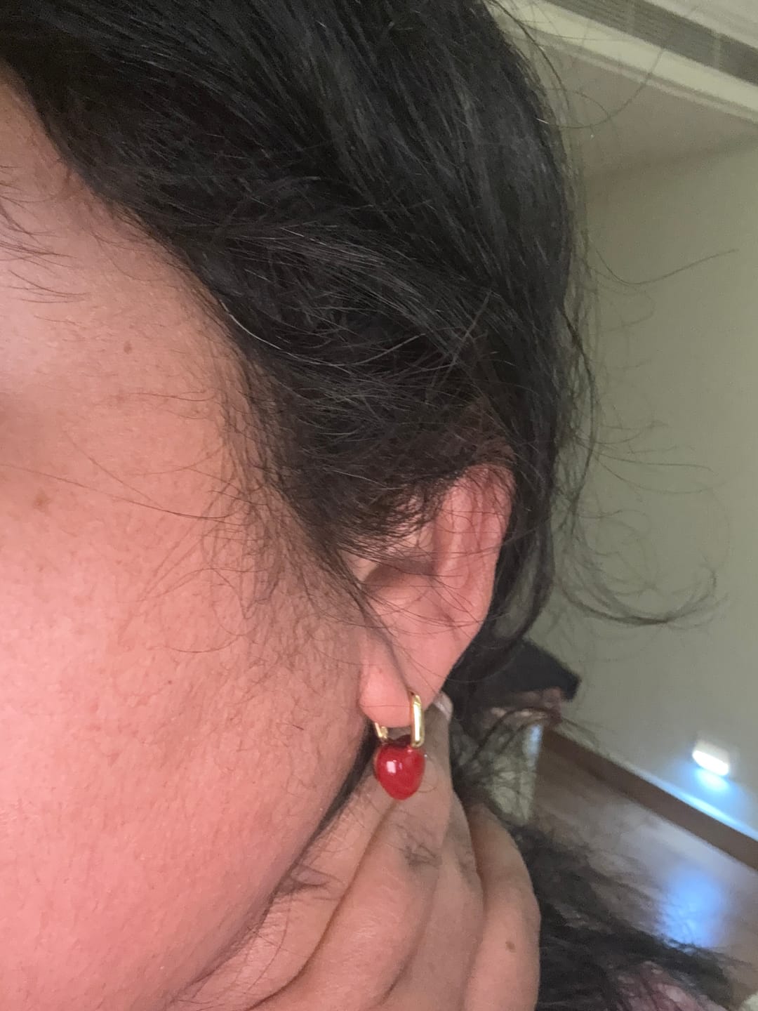 Customer photo review of The Little Heart Earrings