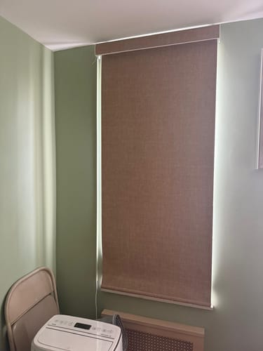 Customer photo review of SmartWings Hardwired Motorized Roller Shades 100% Blackout Vigor