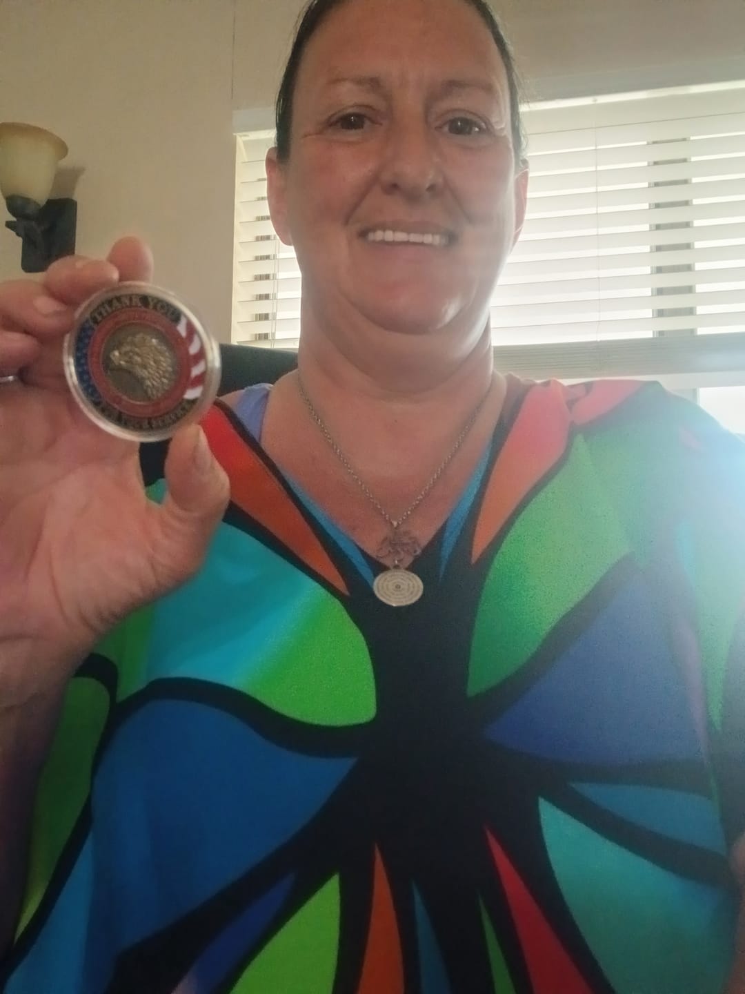 Customer photo review of Honoring All Who Served Thank You Coin