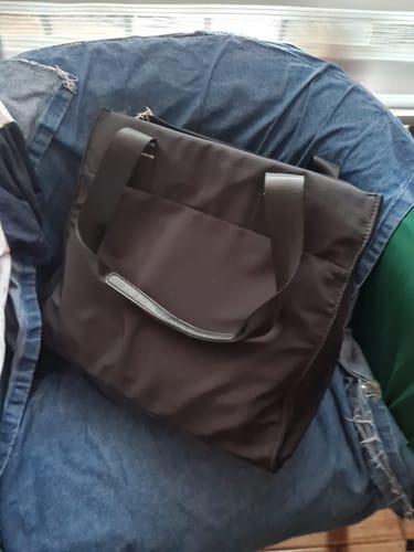 Reseña con foto de un cliente sobre Cartera De Hombro Para Notebook