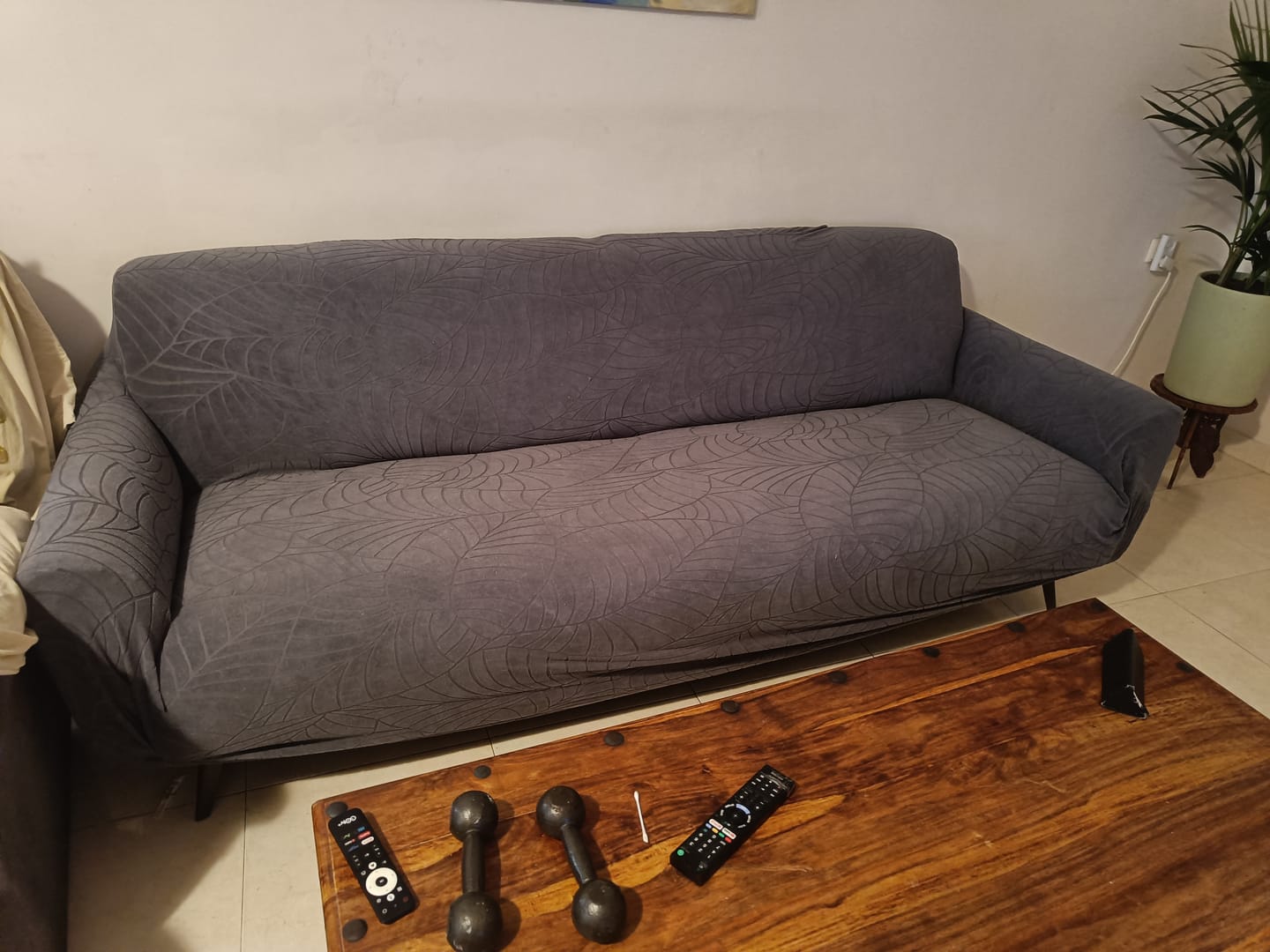 Customer photo review of כיסויי לספה בד ג'קארד דגם עלים נגד מים