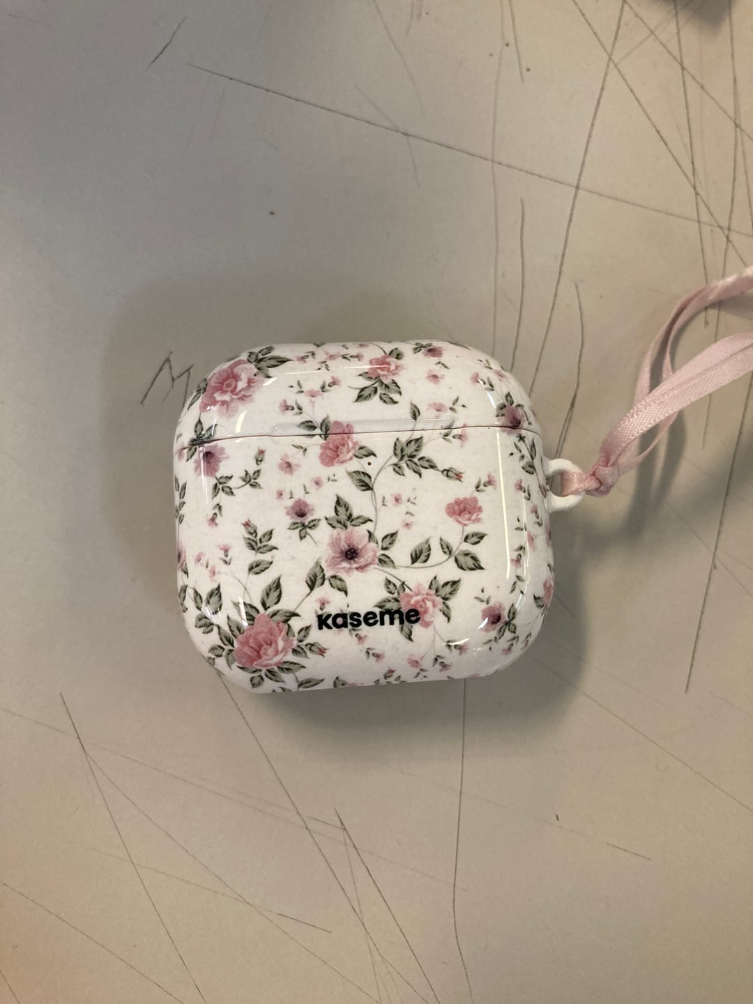 Customer photo review of La Vie en Rose AirPods Case