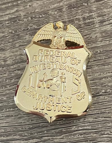 Customer photo review of FBI Special Agent Badge Solid Copper Exact Replica Movie Prop