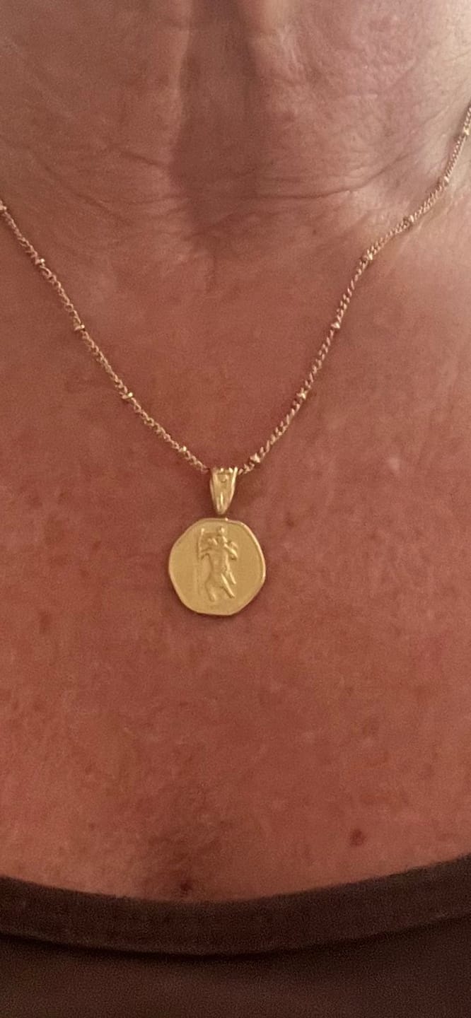 Customer photo review of St. Christopher Necklace - Stay Safe Wherever You Go