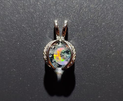 Customer photo review of Wishbone Sparkle Marble Pendant with Opal and Cremation Ashes