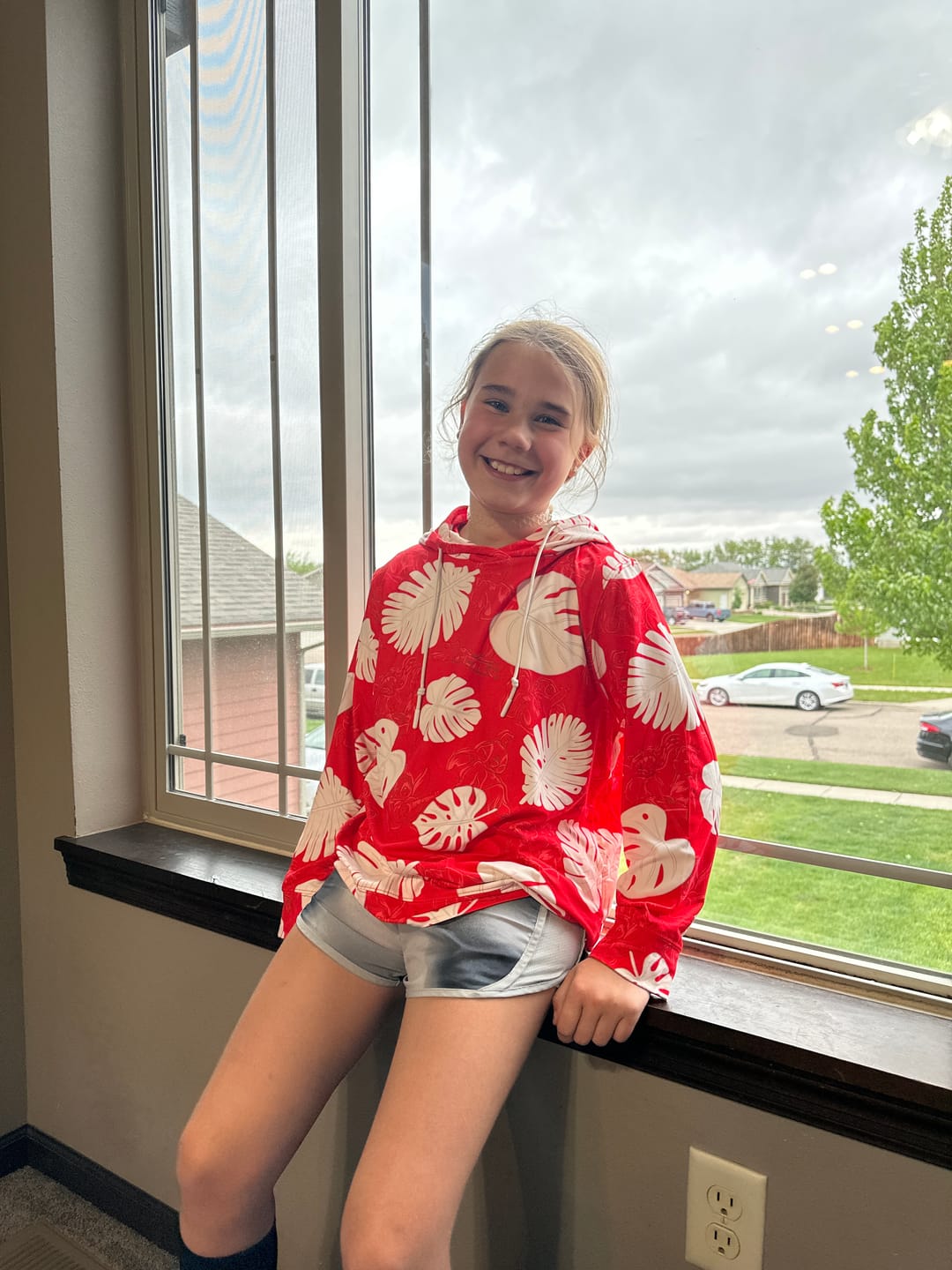Customer photo review of Disney's Lilo & Stitch "He Mele No Lilo" – Youth Performance Hoodie