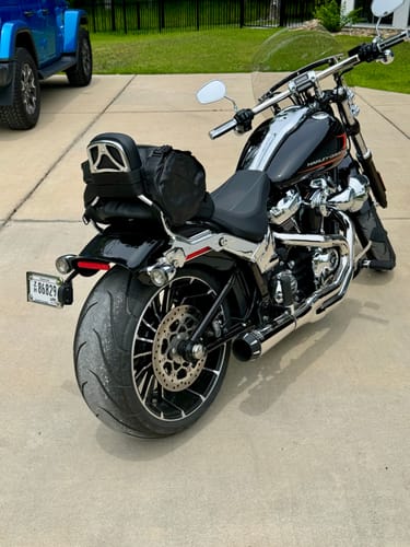 Customer photo review of Leather Roll Bag Mounts to Sissy Bar Easily (14X10X10)