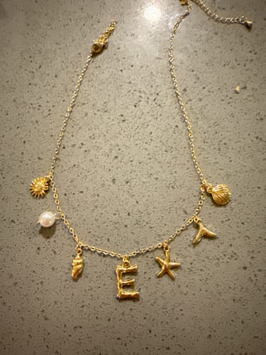 Customer photo review of GOLD OCEAN LETTER NECKLACE