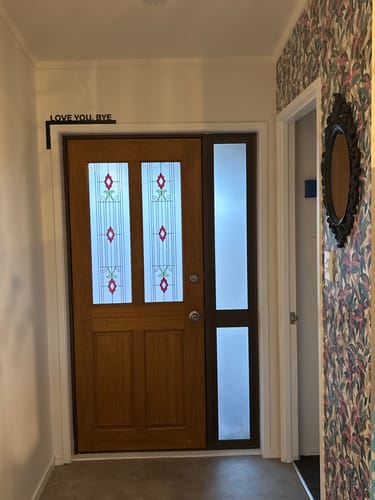 Customer photo review of Love You Bye Door Frame Sign