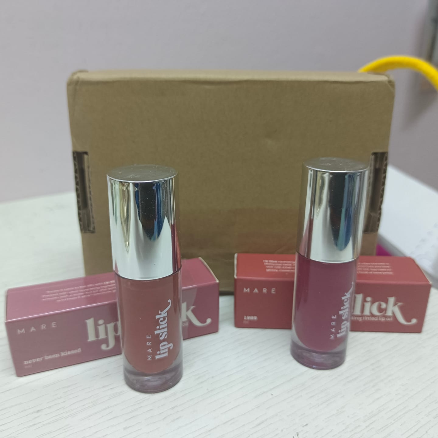 Customer photo review of Lip Slick - Hydrating Tinted Lip Oil