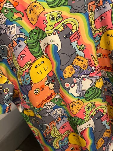 Customer photo review of Exploding Kittens Rainbow Explosion Button Up Shirt