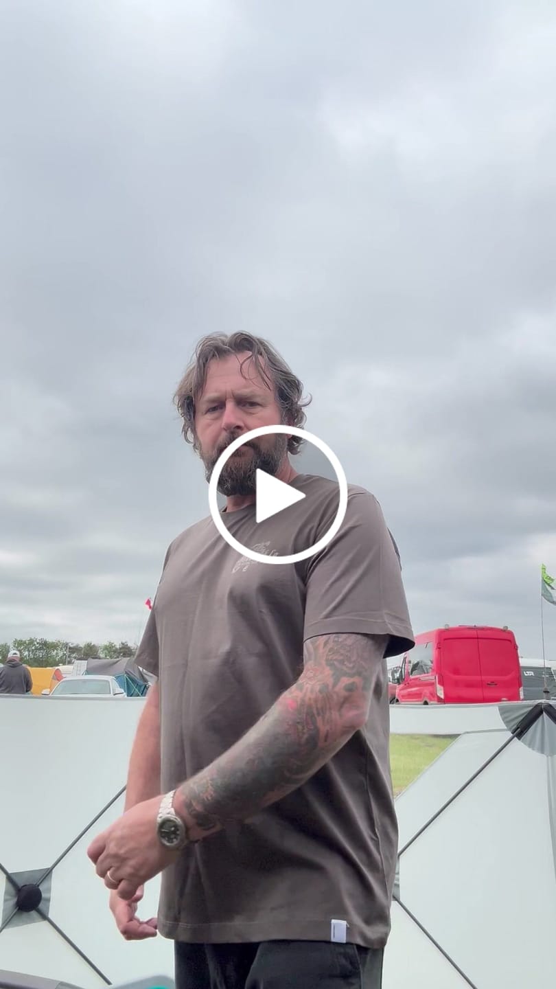 Customer video review of Olive Flattrack Tee