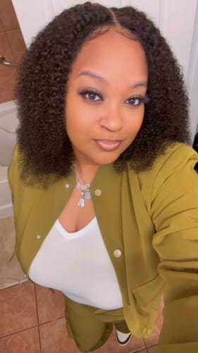 Customer photo review of CurlyMe Pre-bleached Wear Go Glueless Afro Kinky Curly Pre-cut HD Lace Wig Pre-plucked