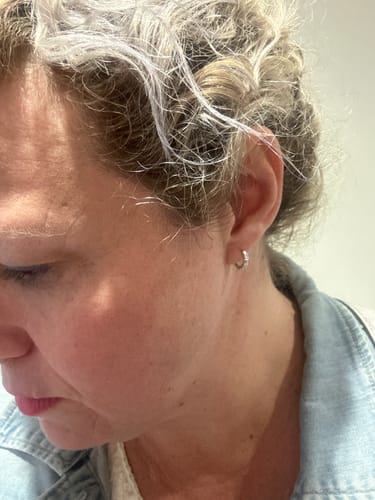 Customer photo review of Cubic Zirconia Huggie Earrings in Sterling Silver
