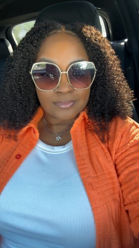 Customer photo review of CurlyMe Pre-bleached Wear Go Glueless Afro Kinky Curly Pre-cut HD Lace Wig Pre-plucked