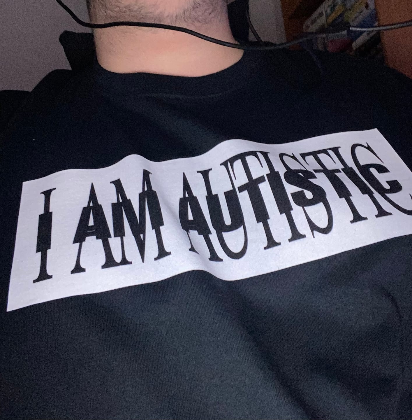 Customer photo review of I AM AUTISTIC T-shirt