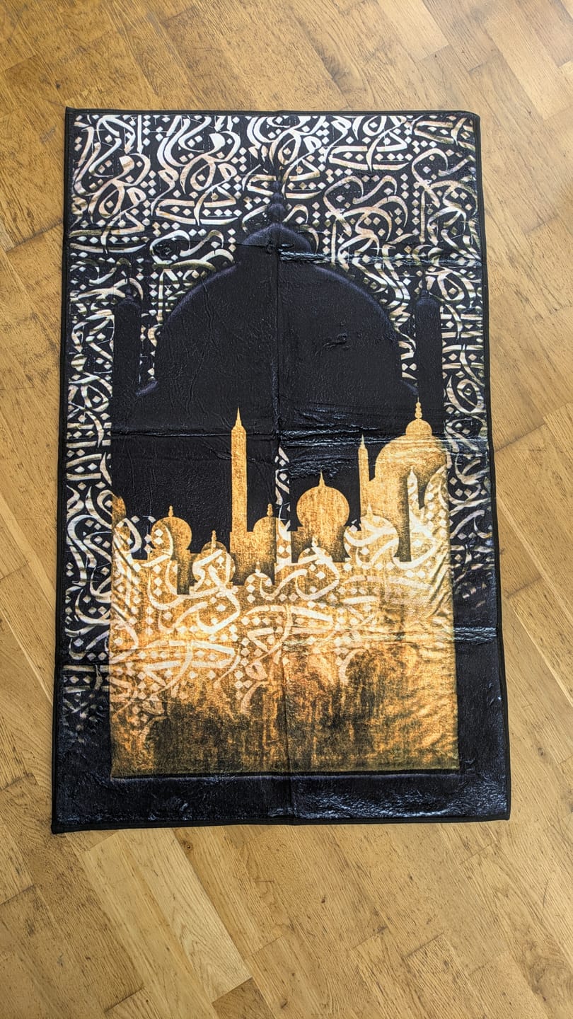 Customer photo review of Dark Arabic Calligraphy  Padded Prayer Mat