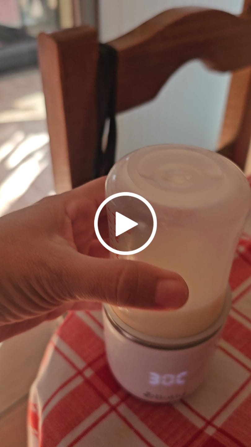 Customer video review of Calentador de mamaderas portátil