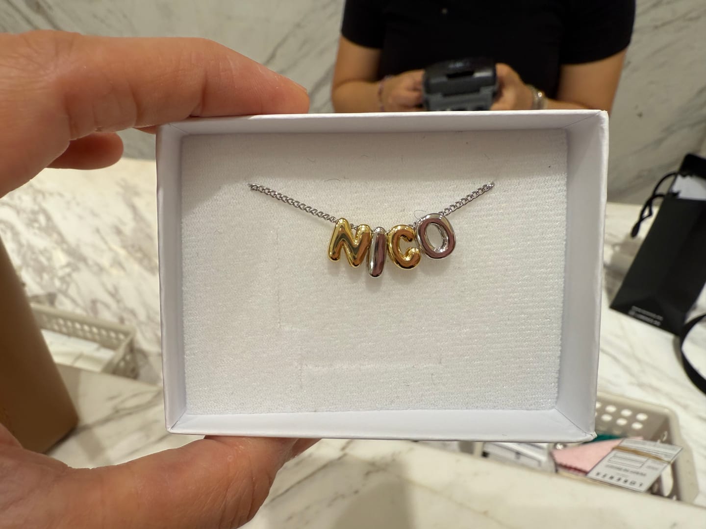 Customer photo review of Personaliza Tu Collar Con Inicial Mini Bubble Combinado